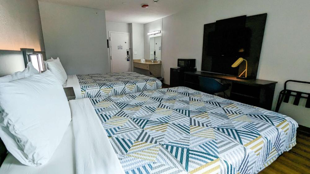 Double Room with Two Beds and Mini Fridge interior